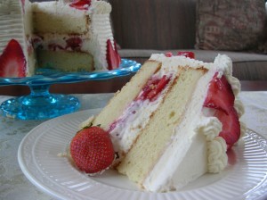 a slice of our White Chocolate Strawberry Cake